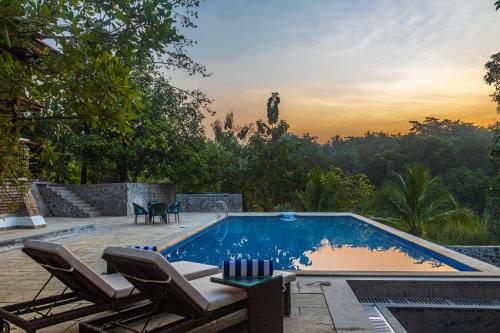 SaffronStays Vedika - EcoFriendly villa by the River with Pool