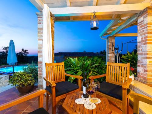 Balkons/terase, Villa Salvea with heated pool in Montizana