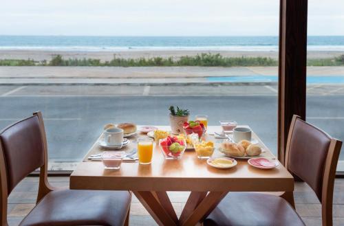 餐廳, Hotel y Cabañas Campanario (Hotel y Cabanas Campanario) in 海洋大道