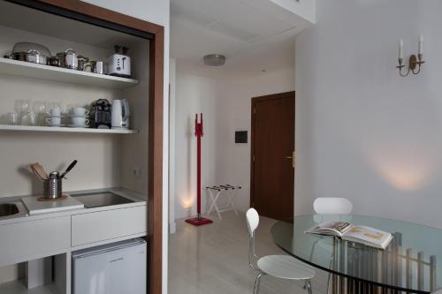 Kitchen, Corso Novara 5 Design Apartments in Naples