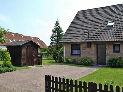 Ferienhaus mit Garten in Nessmersiel in Neßmersiel, Deutschland