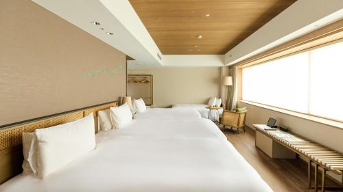 Deluxe Grand Twin Room - 4 Adults image 9