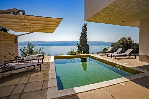 Villa Gust with heated pool, jacuzzi, sauna and cinema