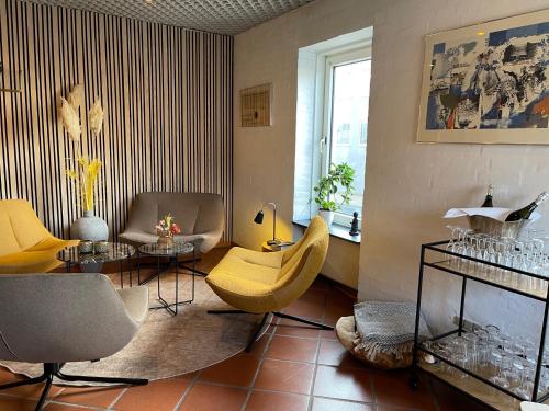 gedeelde lounge/tv-ruimte, City Hotel Nattergalen in Odense