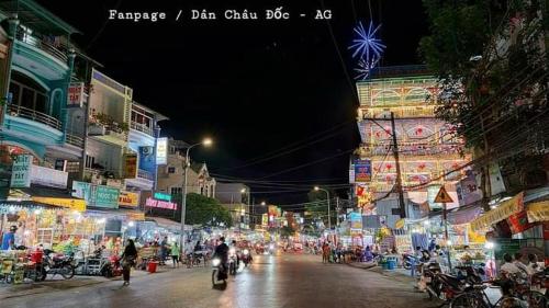 a city street filled with lots of traffic, Phu Thong in Chau Doc (An Giang)