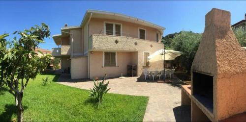 Appartamenti in Villa con ampio giardino esterno