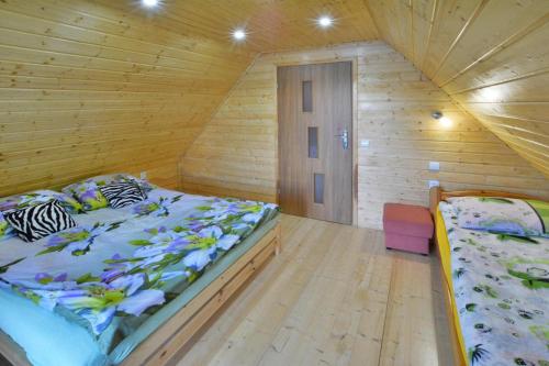Large holiday home with a lake view in Krag (West Pomeranian)