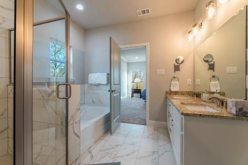 Bathroom, Light-Filled Modern Home near Downtown/Uptown in Cedar Crest