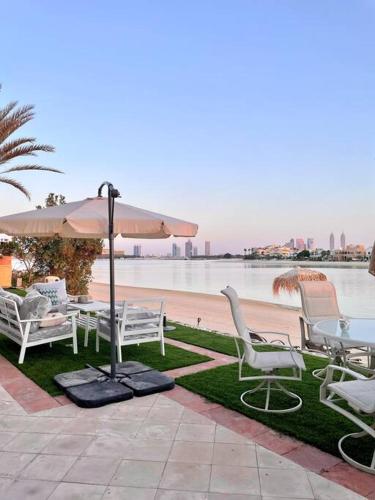 High Number Palm Jumeirah Villa w/ Cityscape View