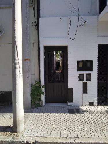 Entrance, Laura in Lisandro de la Torre