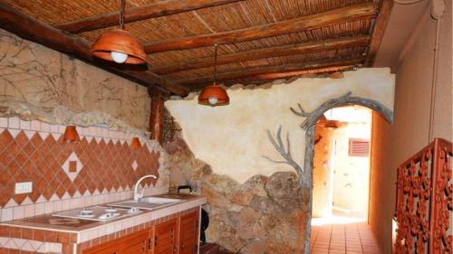 10D - Porto Mannu grazioso bilocale con patio e giardino