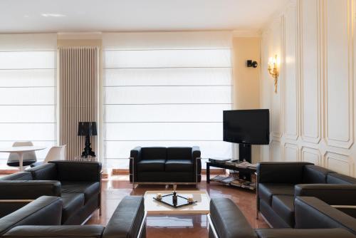 gedeelde lounge/tv-ruimte, Hotel Tourist in Turin