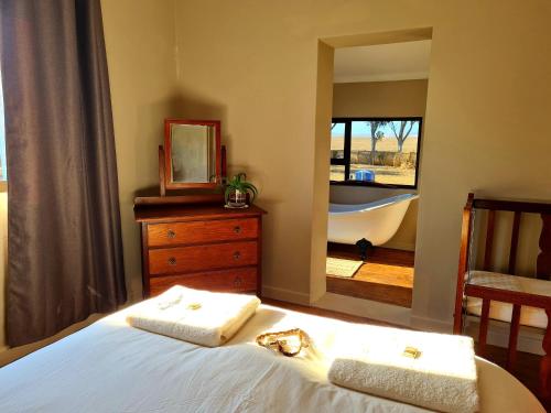 Die Blouhuis Farmhouse Retreat with a hot tub photo 2