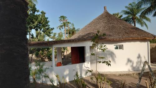 Ngoại cảnh khách sạn, Case traditionnelle diola au bord de l'océan (Case traditionnelle diola au bord de l'ocean) in Cap Skirring