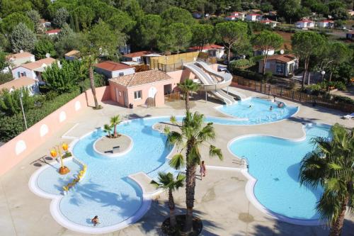 Swimming pool, Caravan park Domaine Sainte Veziane Bessan - LDR01103b-MYB in Bessan