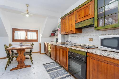  GuestHost - Penthouse Central apartments vista Monte Priesnig in Tarvis