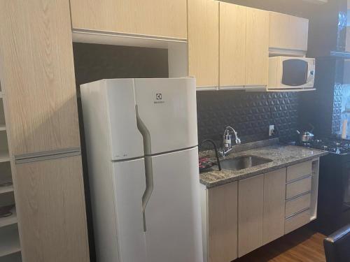 Apartamento decorado 50 metros da praia in วีลาอัสซุงเกา
