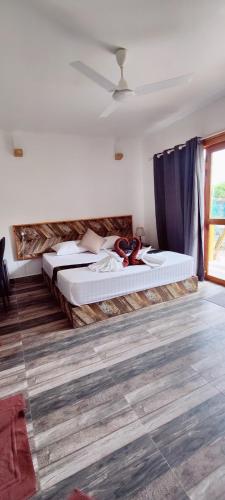 Double Room with Garden View room in Cowry Inn