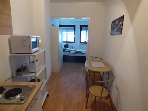 ห้องครัว, Gästehaus-City (Gastehaus-City) in เฮล์มชเต็ดท์