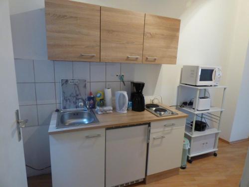 ห้องครัว, Gästehaus-City (Gastehaus-City) in เฮล์มชเต็ดท์