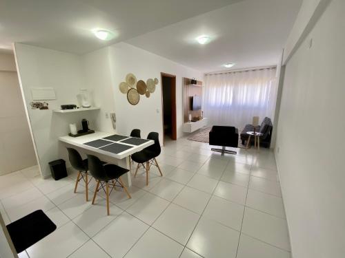 Quarto/sala a uma quadra da praia, com vista mar!