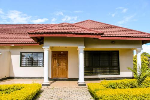 Vchod, Mwaiseni Maisonettes apartments in Ndola
