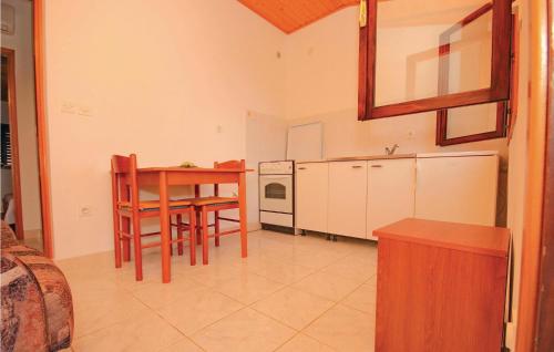 Amazing Apartment In Prigradica With Kitchen