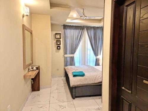 Tranquil & Delightful 1 Bed Apt In Bahria Town photo 2
