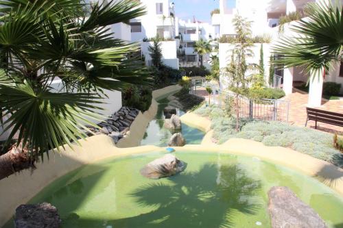 Casa Laurita apartamento con terraza jardin y piscina comunitaria