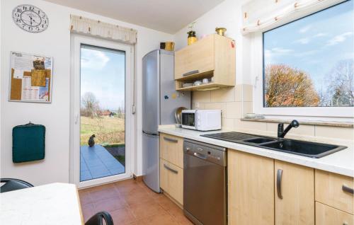 virtuve, Three-Bedroom Holiday Home In Starjak in Starjak