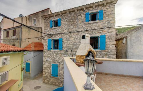  Nice apartment in Susak with 1 Bedrooms and WiFi in 51561 Susak