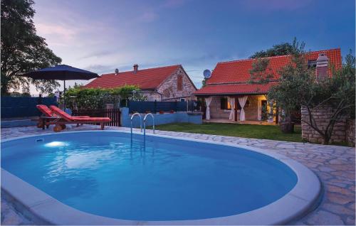 Lovely Home In Oklaj With Outdoor Swimming Pool