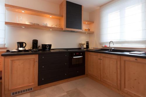 廚房, Appart'hôtels La Maison du Tigre (Appart'hotels La Maison du Tigre) in 斯蒂澤姆奧方內姆