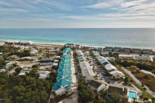 Sunny PCB Home with Balcony Steps to the Beach!