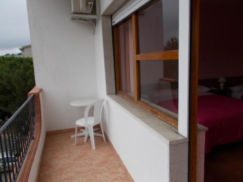 Camera tripla, balcone