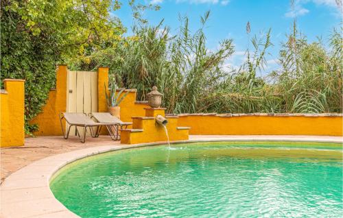  Nice home in Montecorto with Outdoor swimming pool, WiFi and 4 Bedrooms in Montecorto