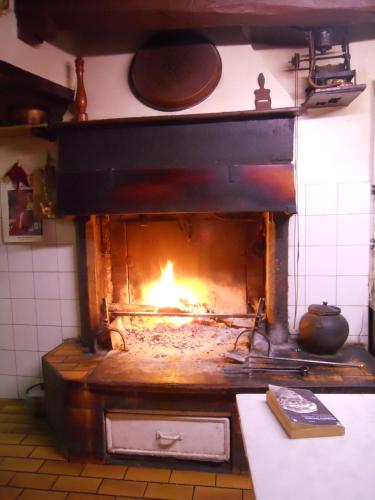 餐廳, Albergo del Ponte in 巴努戴羅曼格那