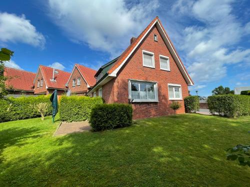 Wellenreiter in Wangerland, Deutschland