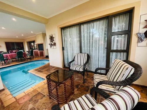 Swimming pool, Casa Alegre Guesthouse in Southbroom