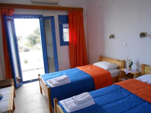 Nikos Place chambre d'hôte Áspros Vólakas