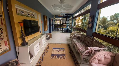 Shared lounge/TV area, Pousada Stand Up! Guaruja in Guaruja