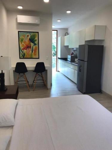Estudio en Puerto Aventuras, Condominio con Alberca # 202 in Puerto Aventuras, Mexico