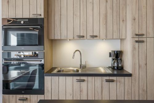 廚房, Frances - Charmant appartement vlakbij het strand in 米德爾凱爾克