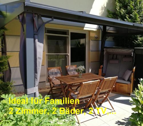 Ferienwohnung Berolina mit überdachter Terrasse Wiese 2 Zimmer 2 Bäder 2 TV in Graal-Müritz, Deutschland