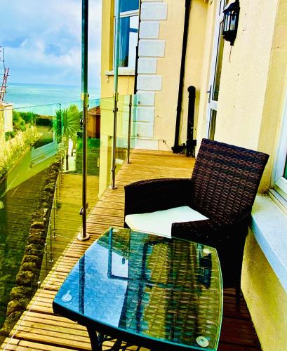 Double Balcony Room With Side Sea View