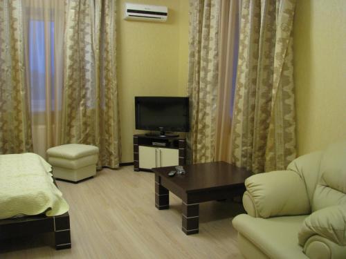 Koplietošanas atpūtas telpa ar TV, Hotel Grant in Pisochyn