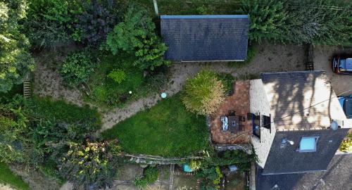 Gemütliches Micro-Haus auf dem Land mit Pool und Privatgarten gîte à louer La Bazouge-de-Chemeré