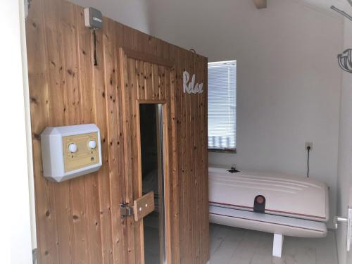 Charming holiday home by the beach with sauna bubble bath and sunbed