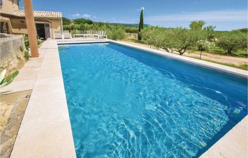 Four-Bedroom Holiday Home in Saint Hilaire D'Ozilha - image 5