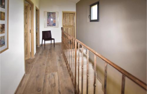 Four-Bedroom Holiday Home in Saint Hilaire D'Ozilha - image 6